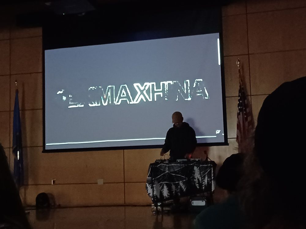 EXMAXHINA performing at Library Out Loud 