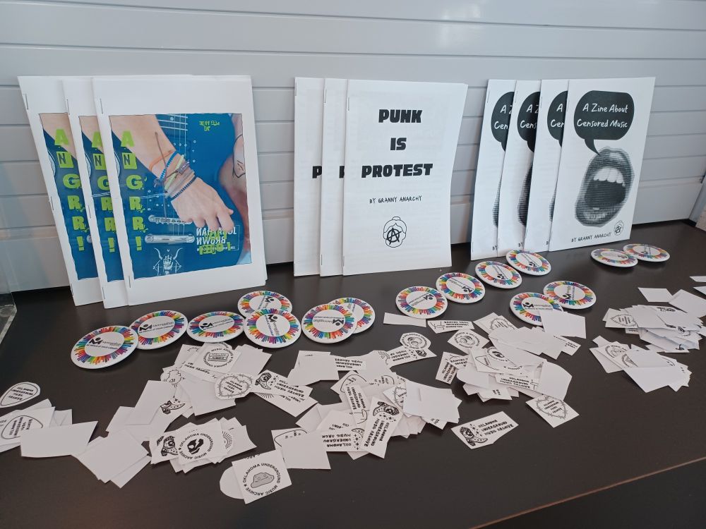 Counter of zines, buttons, and stickers
