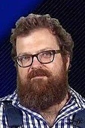 Spencer Hall -- a burly gentleman with a fine, thick beard -- looking approvingly toward my recent donation.