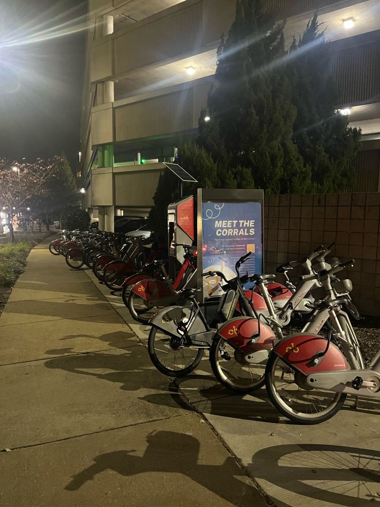 Pic of e-bikes parked at nearly full National Airport Capital Bikeshare station