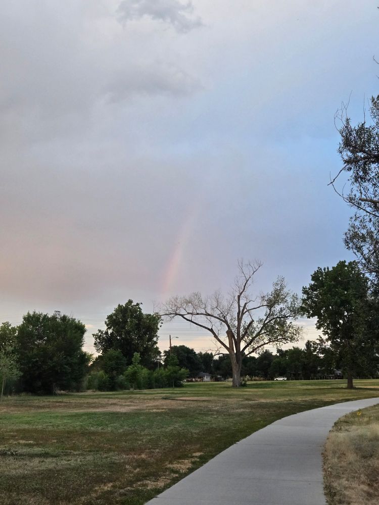Rainbow in stormy clouds.