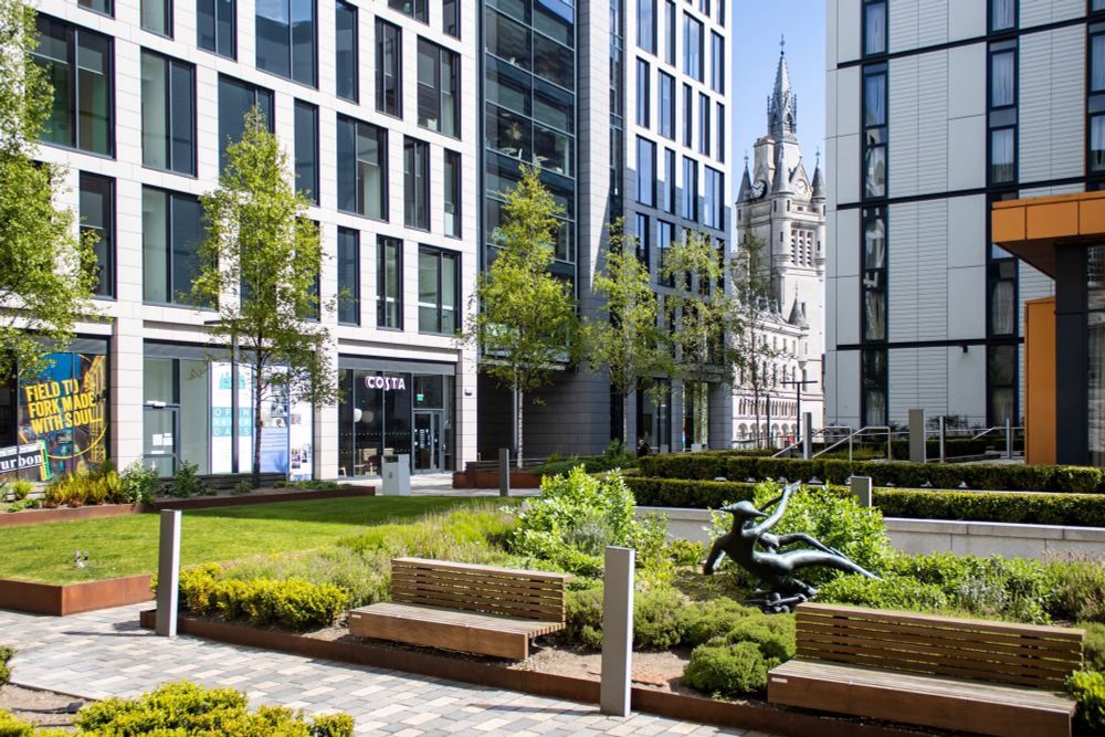 A glimpse of Aberdeen Town House between the buildings of Marischal Square.