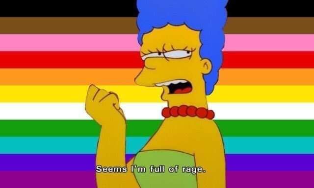 Marge Simpson in front of agay flag said "it seems I'm full of rage"