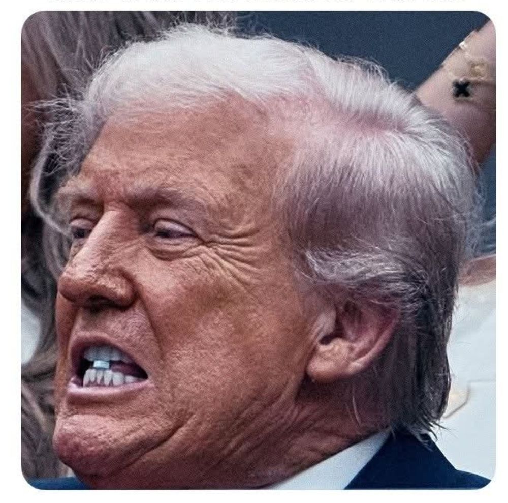 Photo of Donald Trump holding a blue pill in his teeth during the US Tennis Open. 