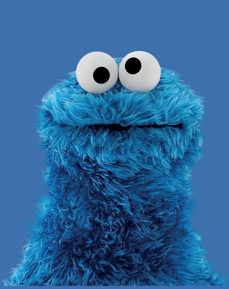 A mugshot of sesame street's cookie monster