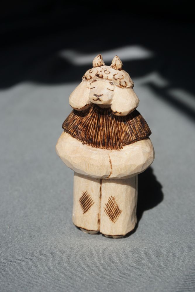 Wooden carving of a goat boy character #furryart #furry #sculpture #woodworking
