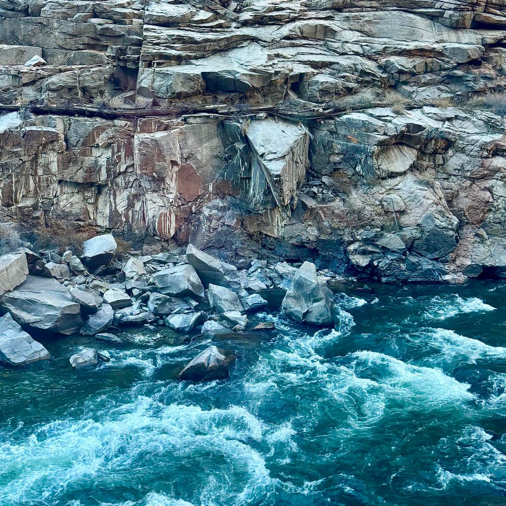 Layers of rock cradle the running water of the Arkansas River,which has patiently shaped patterns and pathways over millions of years.
