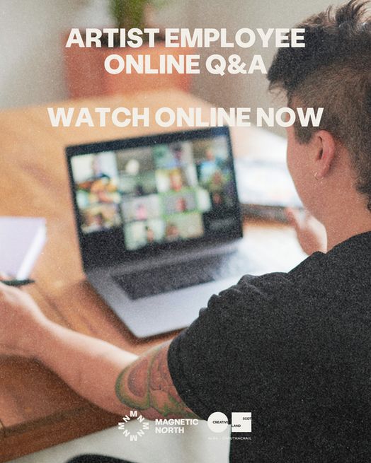 A person with short dark hair sits at a wooden desk, looking at a laptop screen showing a grid of people in an online video call. Overlaid white text reads “ARTIST EMPLOYEE ONLINE Q&A — WATCH ONLINE NOW.” Logos for Magnetic North and Creative Scotland appear at the bottom of the image. The lighting is soft and warm, suggesting a casual home workspace.