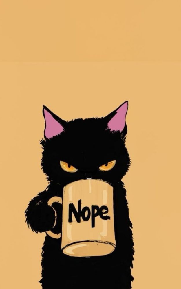 Kitty drinking from a yellow coffee mug with “Nope” in black letters imprinted on its side.