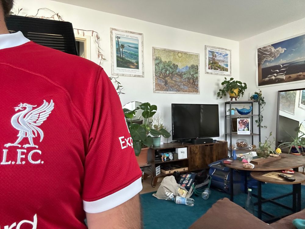 My Liverpool shirt and living room in chaos because we are leaving tomorrow. 