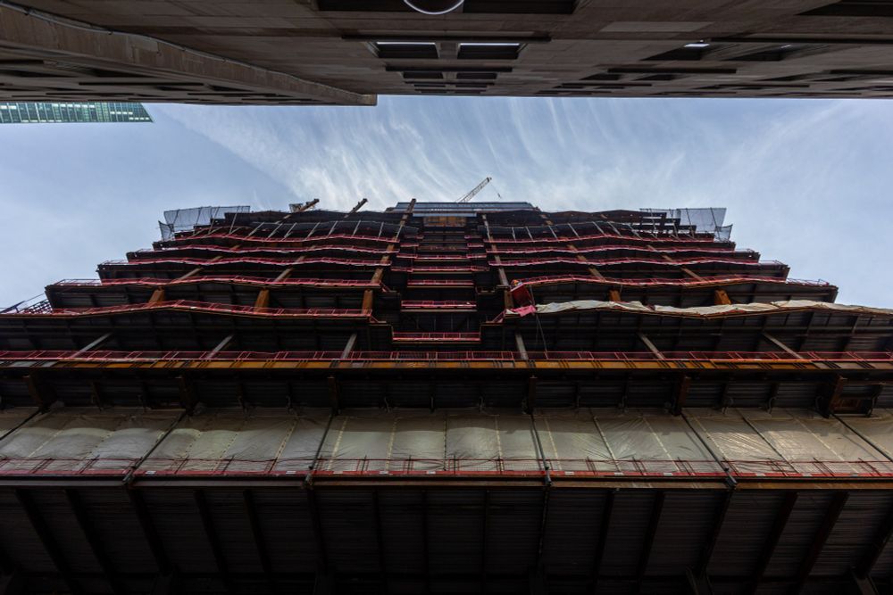 2023-11-16 Toronto Ontario Canada - Wide angle color photo looking up at the waving metal frame construction of a skyscraper.
Canon R6 16mm f6.3 1/160s iso250