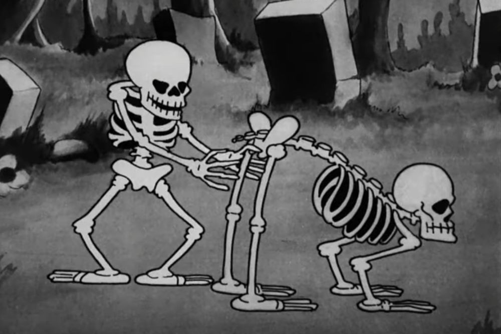 a skeleton on all fours with its ass in the air as another skeleton appears to be about to grab its ass