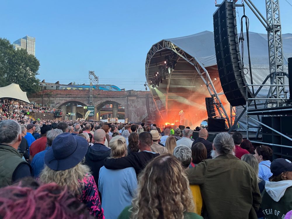 Another train passes the Castlefield Bowl while Elbow are on stage. The sunlight is starting to fade and it's a beautiful evening.