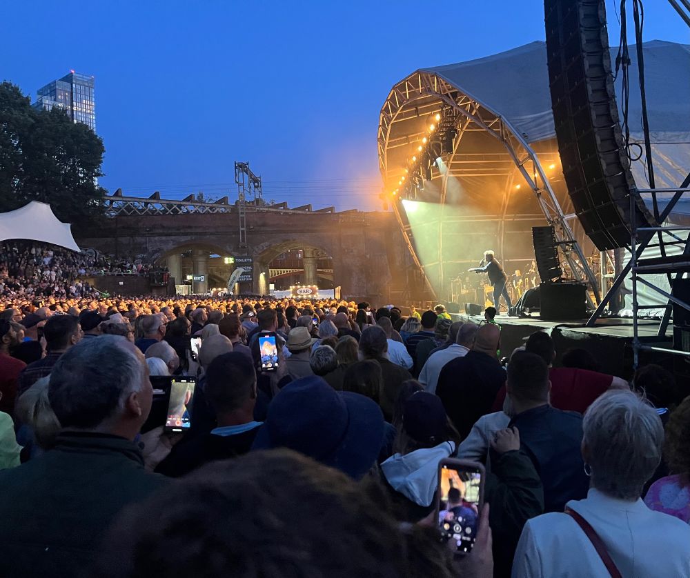 Gut Garvey picked out by a spotlight as he gets the crowd involved in a sing along during the encore.