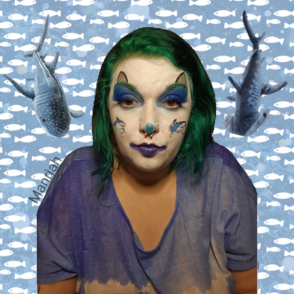 Manriah wearing shark clown makeup 