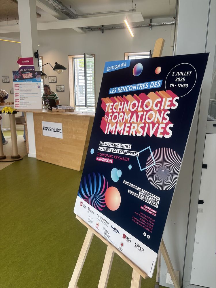 Une photo du panneau d'accueil de l'événement Rencontres des Technologies et Formations Immersives