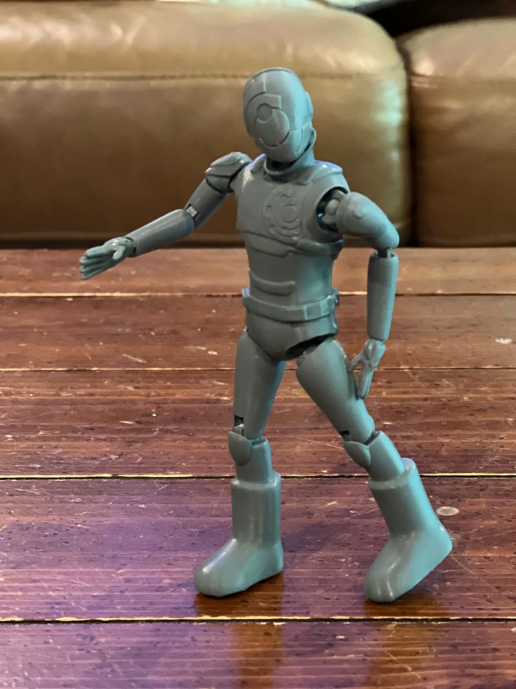 3D print of an articulated Murderbot action figure like from the opening sequence. 