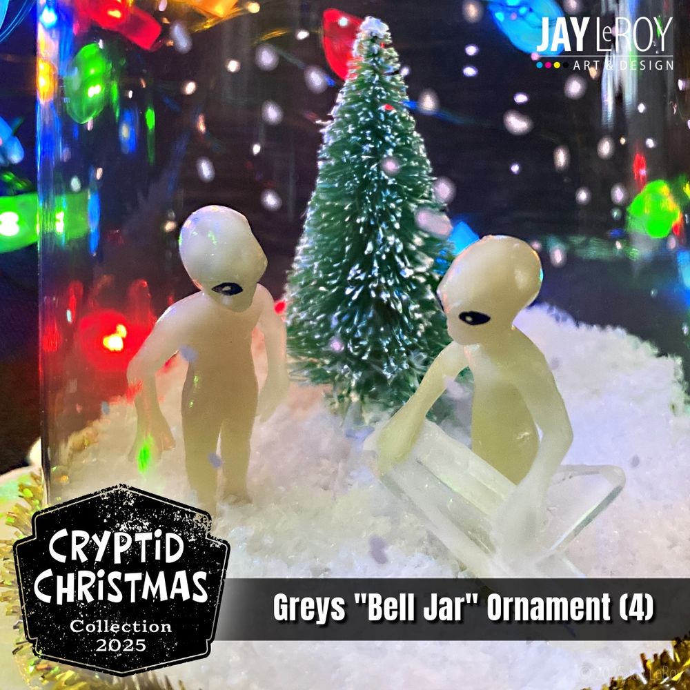 Two miniature grey aliens standing in a snowy scene, one is holding a large piece of quartz