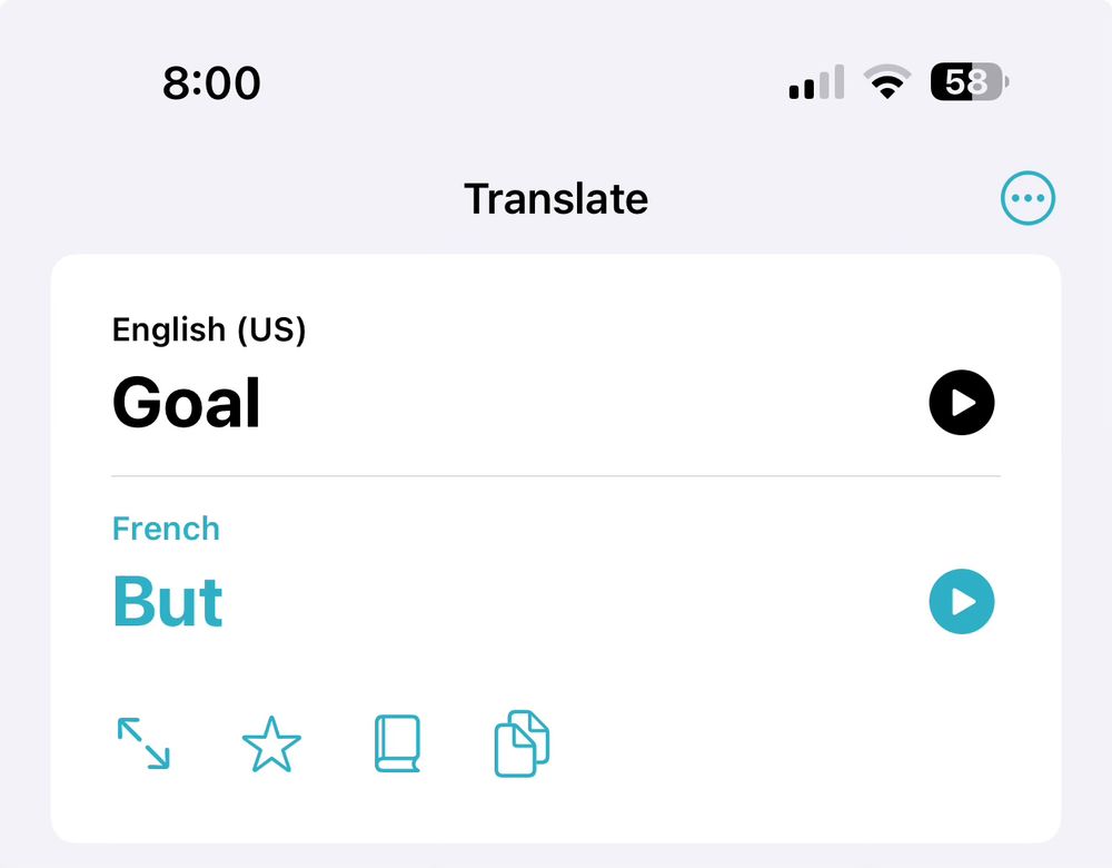 A screenshot of Apple's Translate app for iOS showing that "goal" in English is "but" in French