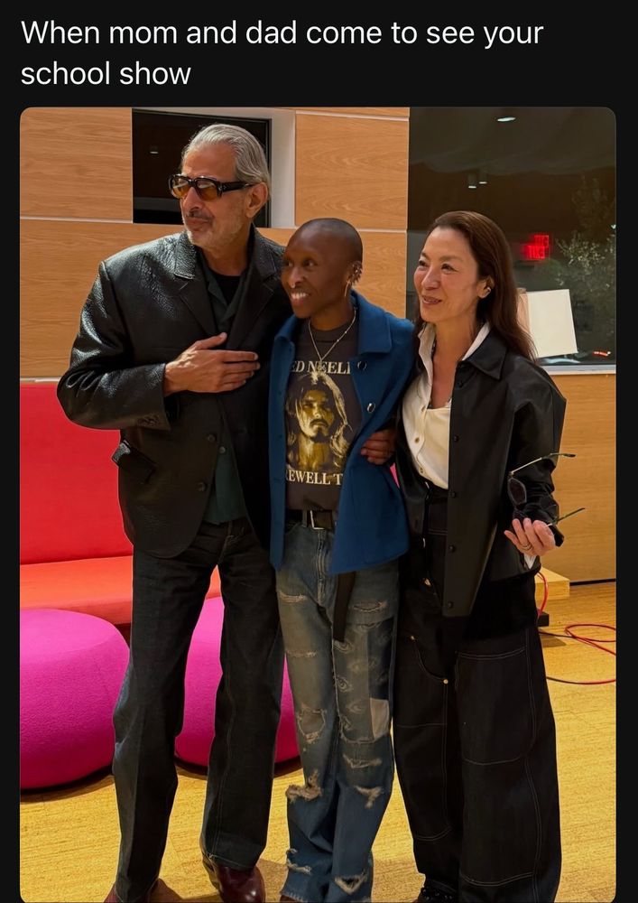 a post on threads with a picture of cynthia erivo, jeff goldblum and michelle yeoh backstage at jesus christ superstar with the caption “when mom and dad come to see your school show” (credit to original author clary_poppins)