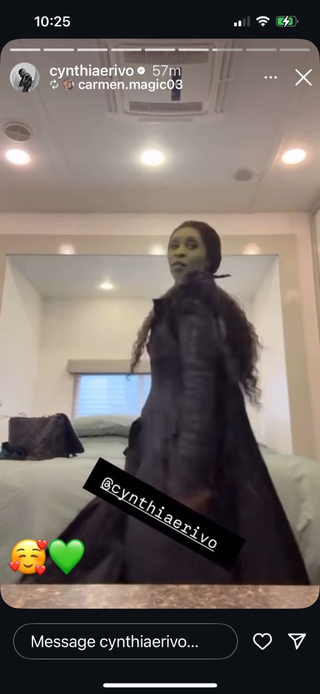 a screenshot of cynthia erivo’s latest tiktok of her in full green makeup and an outfit from wicked: for good 💚