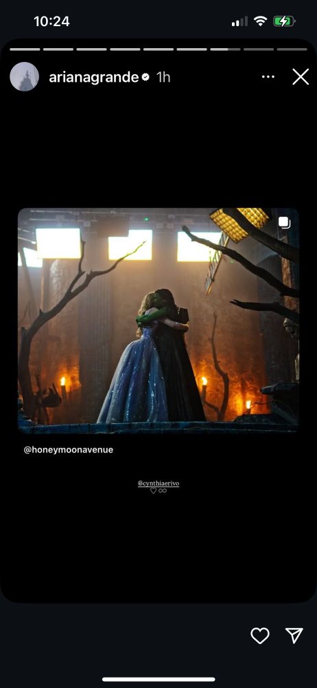 ariana’s instagram story featuring a photo from the wicked: for good set with the two of them hugging. cynthia is tagged and there is a ❤️ and ♾️ emoji