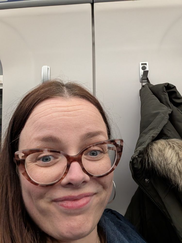 Female at a seat with no window 