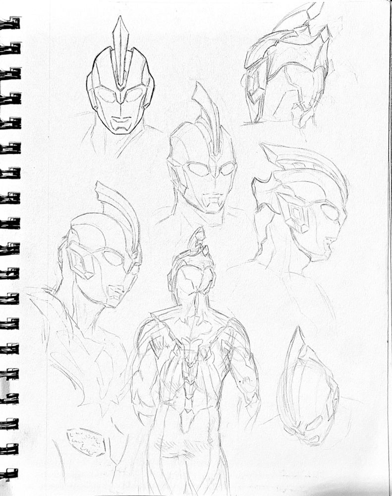 Sketchbook page with multiple sketches of Ultraman Omega’s head from various angles, and one sketch of his back design. All sketches are pencil lineart without shading, with one in top-left corner lined with pen. 