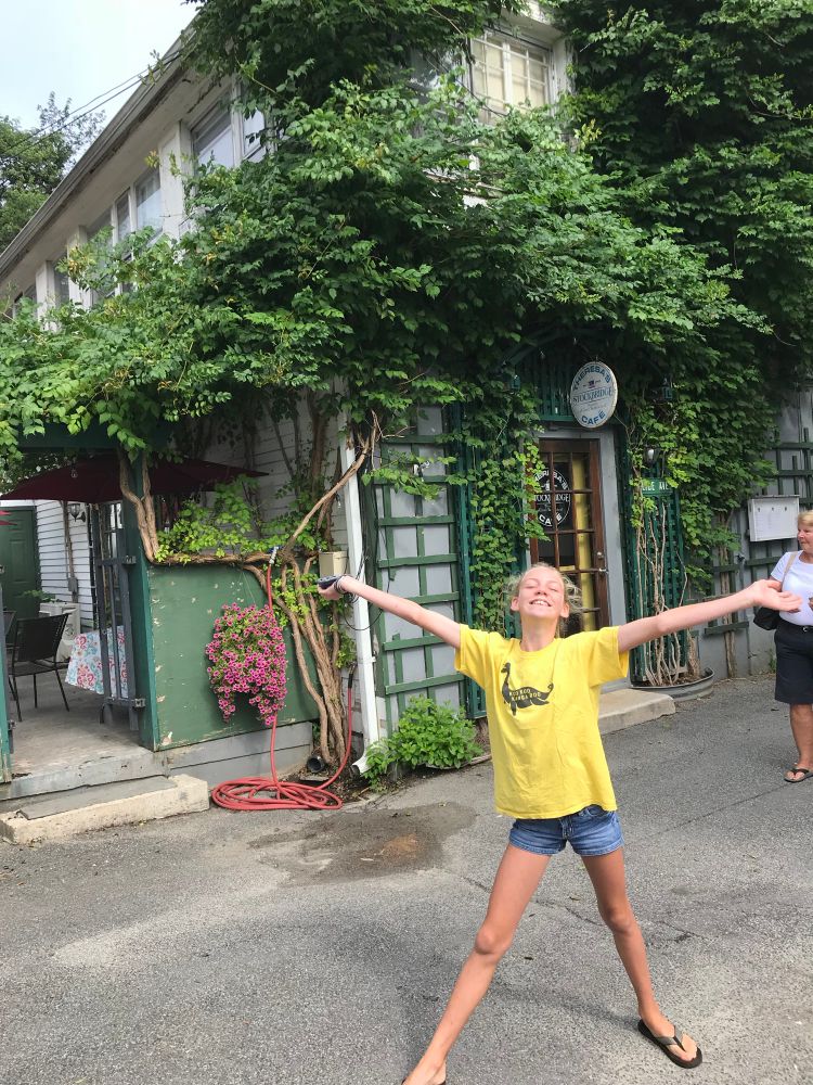 The youngest in front of the original Alice’s Restaurant.  It’s around the back, just a half a mile from the railroad tracks.