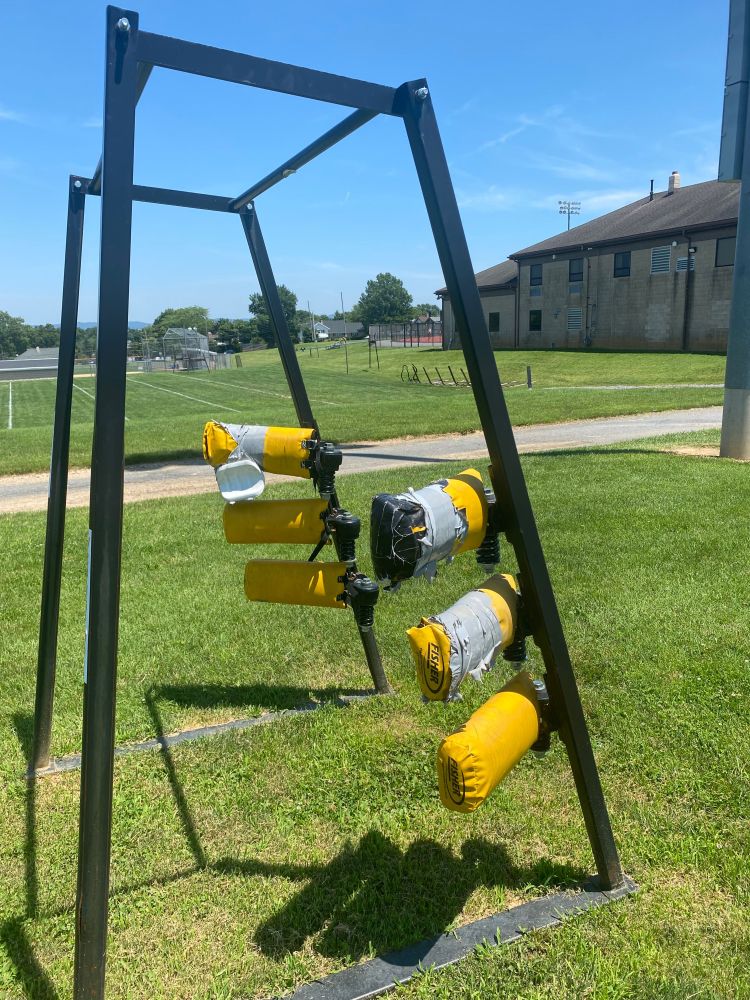 don't know the name, but the running backs would have to run/fight thru the pads when they are closed together