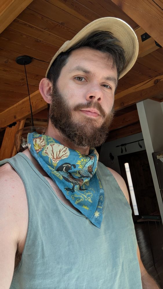 A selfie of me wearing a Mustard Beetle Channel Islands bandana.