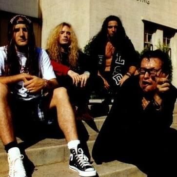 Pic of all members from the band Life Sex & Death, sitting on stairs