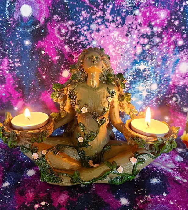 Fae creature sitting legs folded, looking up to the sky holding 2 tea lights