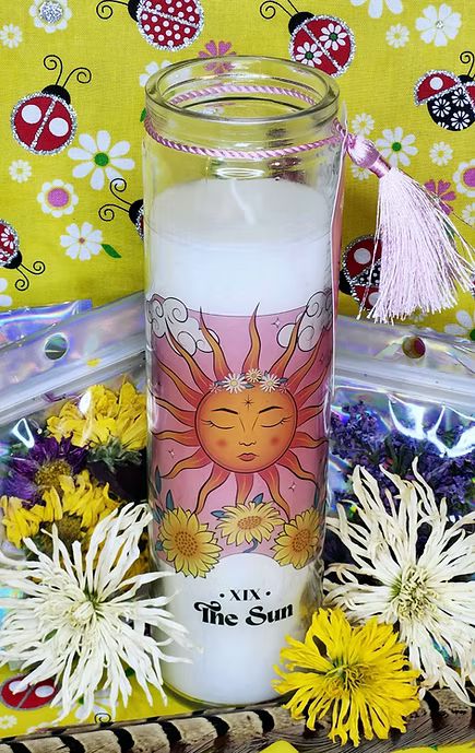 The sun tarot card altar/spell candle