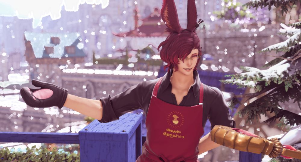 Red-headed Viera man, dressed in red apron and mittens, showing off how he can turn snowflakes into little bright stars.