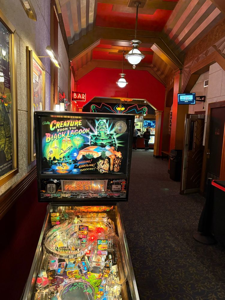 photo of The Creature From The Black Lagoon pinball machine in the lobby of The Coolidge Corner Theatre