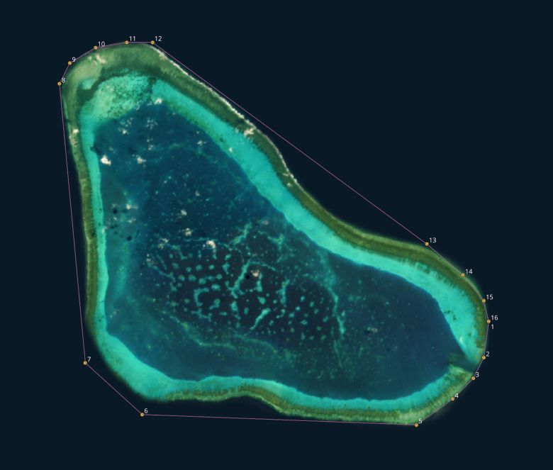 Satellite image of Scarborough Shoal in the South China Sea with Chinese declared baselines marked