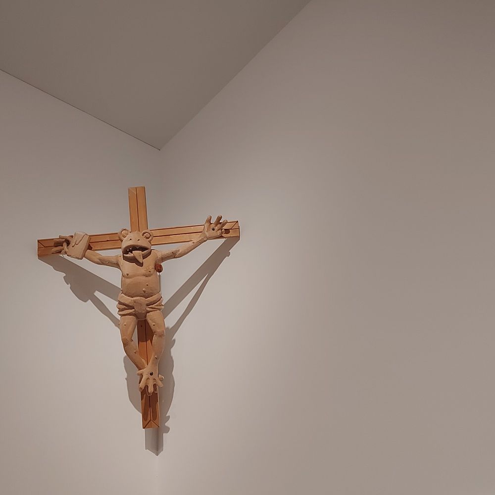 crucified frog