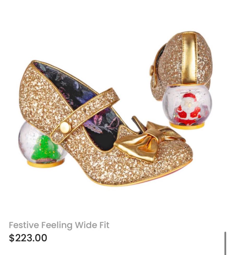 sparkly gold “festive feeling wide fit” shoes with snow globes for heels