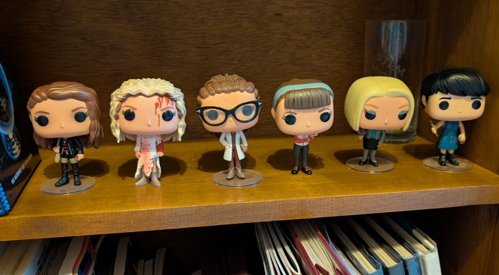 Orphan Black Funko Pops L to R: Sarah, Helena, Cosima, Alison, Rachel and Felix