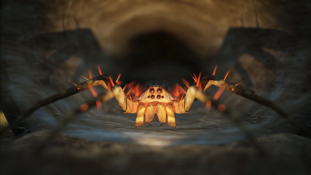 A glowing red spider casts a shadow over its burrow in Empires of the Undergrowth. Hint: this isn't even the Hungry Spider.