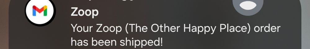Screenshot of a notification reading "Zoop. Your Zoop (The Other Happy Place) order has been shipped!