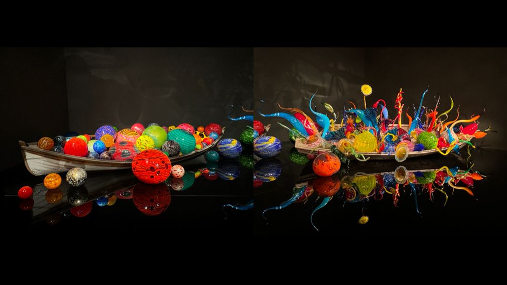 There seemed to be inspiration from nature and from ethnic cultures at this exhibit. I can’t recall what led to this impression, but this reminded me of the Potlatch ceremonies of the Northwest tribes. 
Slender boats in a dark room are filled with colorful glass globes and spires shining in the spotlight. 
