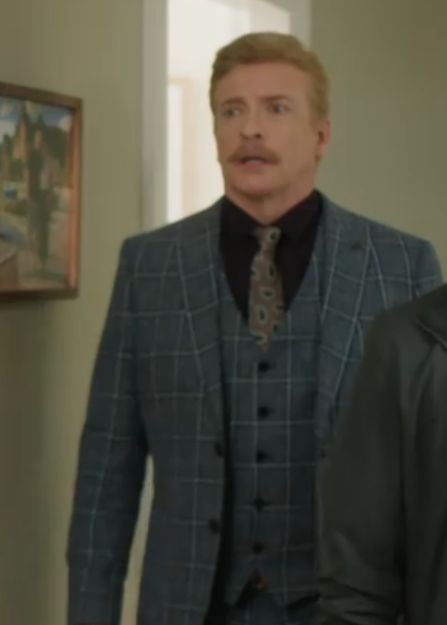 Rhys looks shocked, his skin here is a little more pale then usual and it looks great with his white hair and moustache.