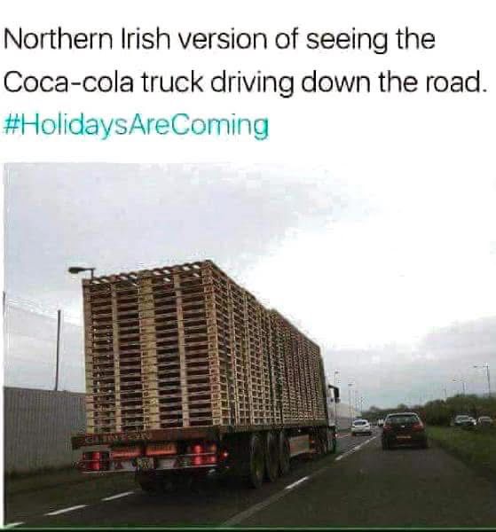 Articulated lorry carrying wooden pallets