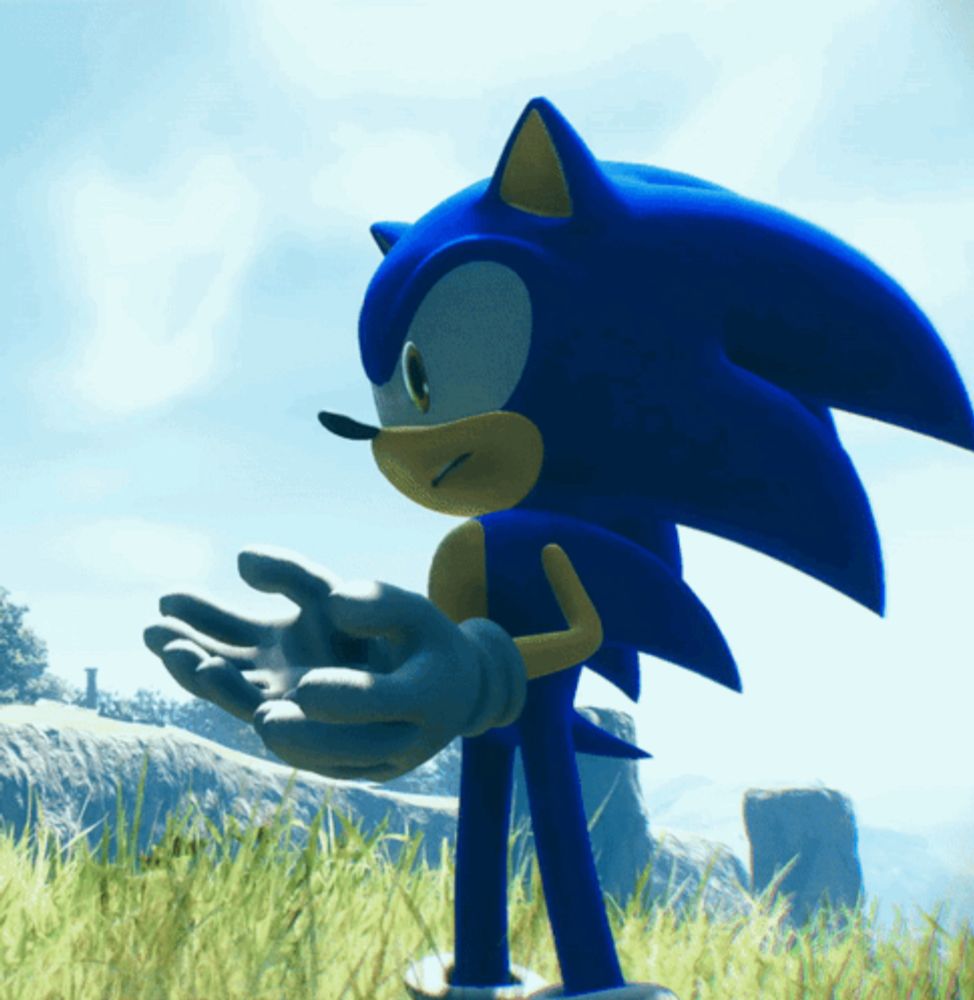 a sonic the hedgehog standing in the grass with his hand outstretched