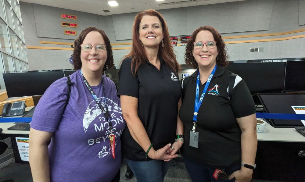 My twin sister (left) and myself (right) standing with Charlie Blackwell-Thompson, launch director at NASA's Kennedy Space Center in the Launch Control Center during Family Day!