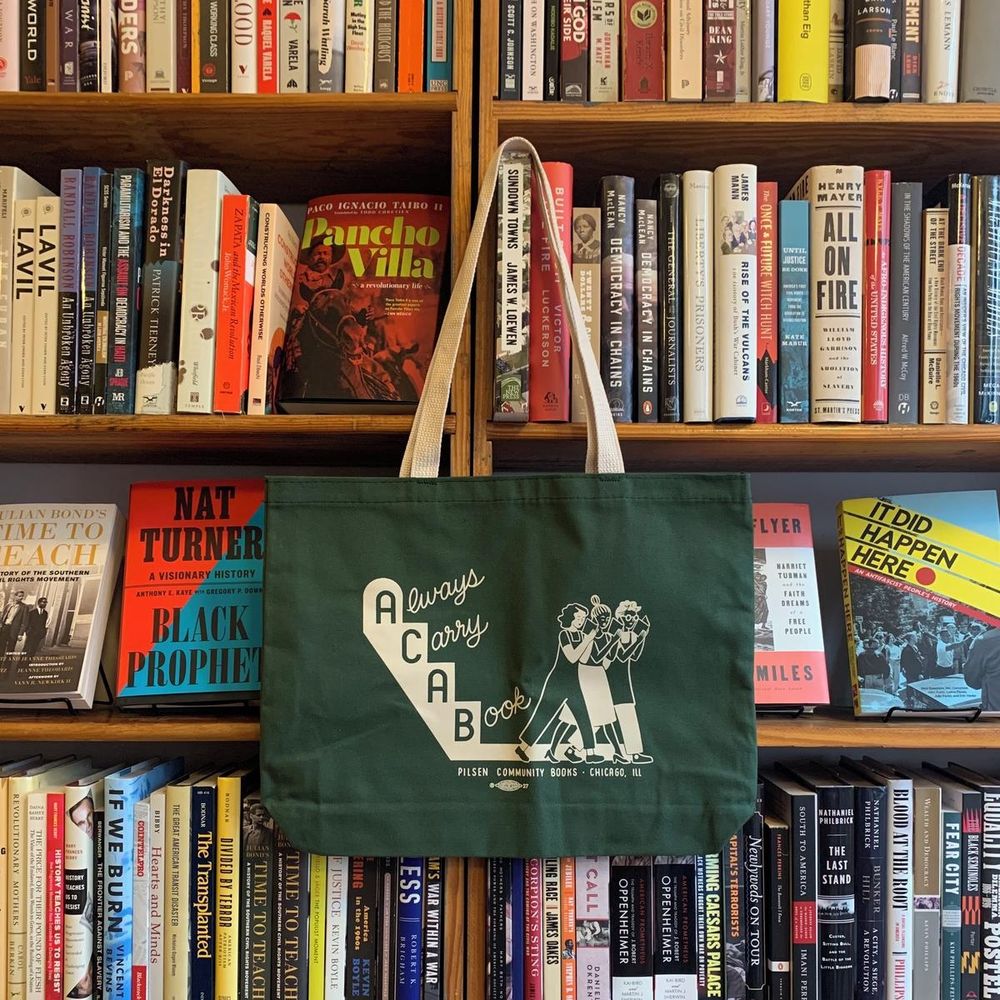 Image of Pilsen Community Books "Always Carry a Book" tote.
