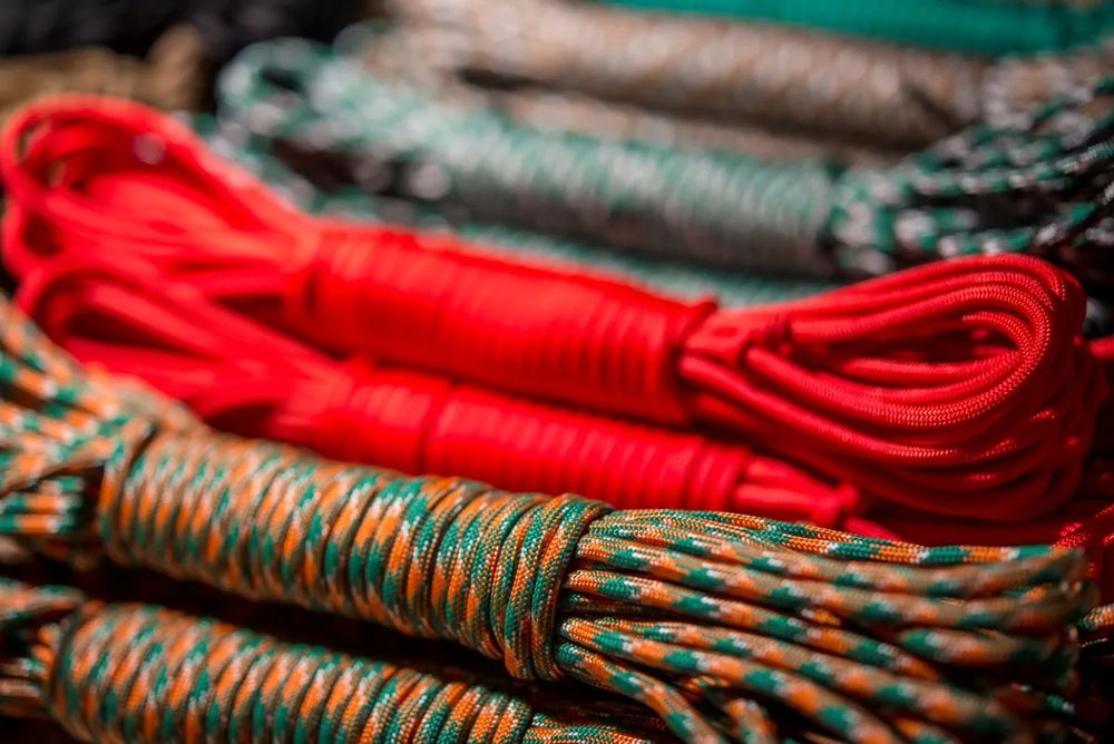 Different colours of lengths of rope tied up