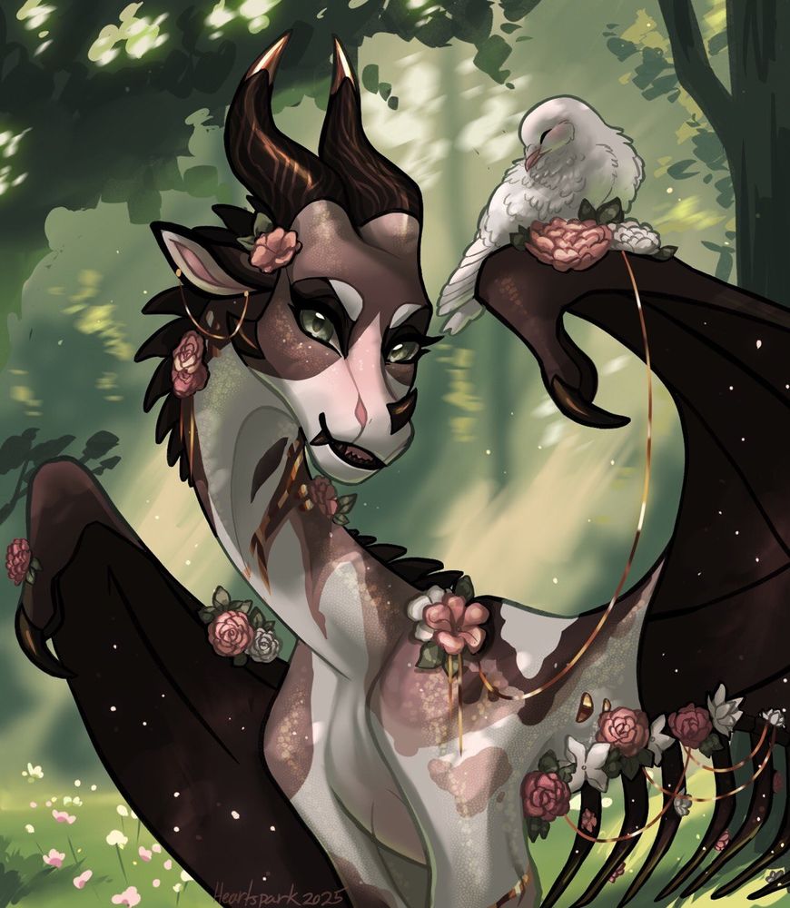 A white and brown piebald dragon stands in the shade under a tree, it has several pink and white flowers and a dove on its wing looking very cozy and comfortable 